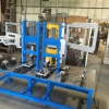 This Machine will test the functionality of the (4) calipers and take a force reading each cycle. The operator will load the master cylinder to the fixture & mount the calipers to the blades then shuttle the master cylinder under the fill & seal slide unit.