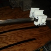This Applicator Tool (1LH & 1RH) was designed and built in 1 week from a few pictures the customer supplied. This tool rides on the car door frame, while removing the backing off the Sash Blackout Decal, guides and presses the Decal strip to the door all in one motion.